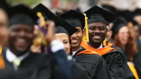 Getty Images Graduating students participate in commencement exercises at City College on June 3, 2016 in New York City.