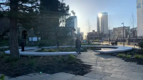 People visit memorial in Manchester city centre