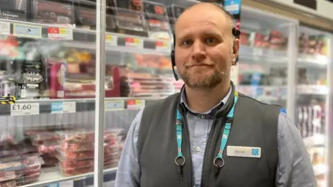 BBC David Brook, store manager at the Co-op in Burley Street, Leeds