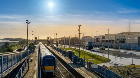 Dawid Kalisinski A train on a track at a Dublin transport hub