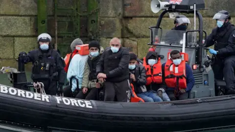 PA Media Boat of migrants at Dover