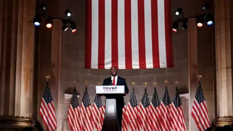 Getty Images Tim Scott addresses the convention from Washington DC