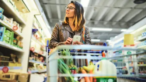 Woman shopping in a supermarket