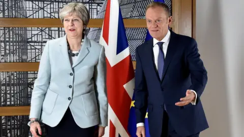 Reuters Theresa May and Donald Tusk