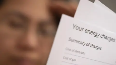 PA Media Man with power bill