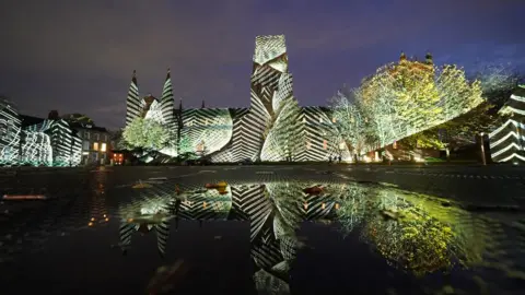 Owen Humphreys/PA Durham Cathedral lit up during Lumiere 2023
