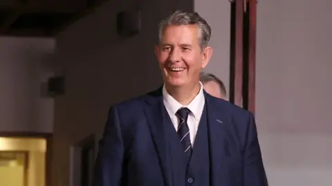 Liam McBurney Edwin Poots