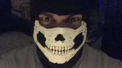 Counter Terrorism Policing North East Dymock in mask