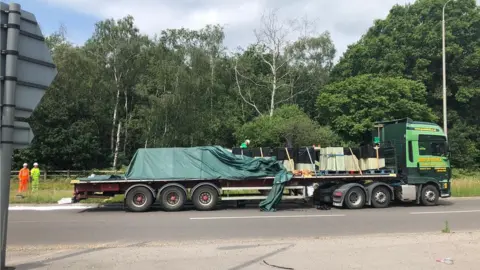 Lincoln bypass closed after battery acid spill