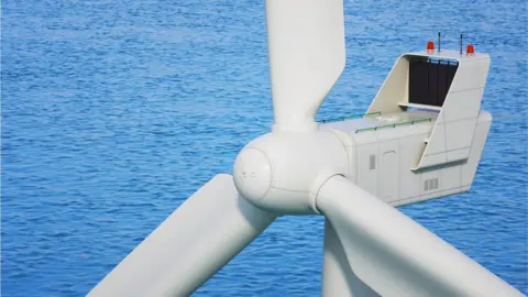 Getty Images Industrial wind turbine close up in sea