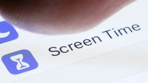 Getty Images Apple's Screen Time tool for iOS devices shown on a screen