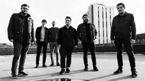 The Shoot/Libertino Records Nathaniel (third from left) is a member of the Welsh language band, Breichiau Hir