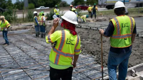 Getty Images Workers in Houston