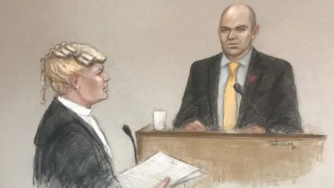 Julia Quenzler Emile Cilliers appearing in the defendants dock at Winchester Crown Court