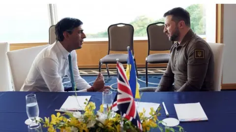 PA Media UK Prime Minister Rishi Sunak (left) and Ukrainian President Volodymyr Zelensky. Photo: May 2023