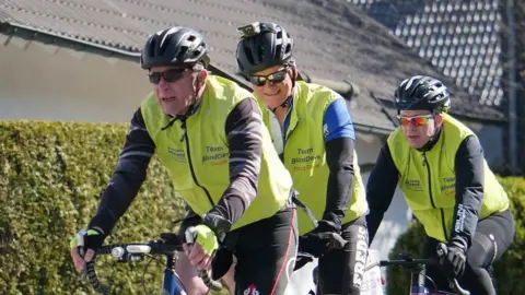 John Bray/BBC Dave Heeley and fellow cyclists