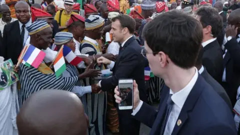 Getty Images President Macron in Ivory Coast