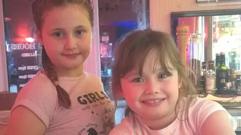 Emma Payne Charlotte, 10, and Sophie, eight