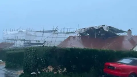 Scaffolding was blown down from a roof in St Saviour