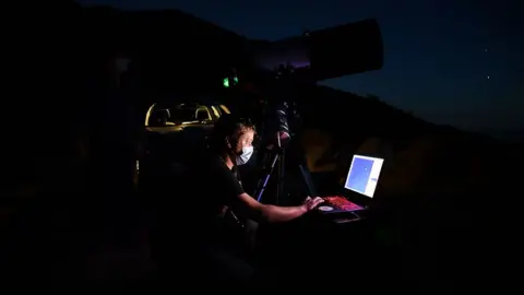 Rodin Eckenroth / Getty Images Astronomer Blake Estes