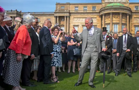 Getty Images Prince Charles, in 2019, greeting guests at a Buckingham Palace garden party