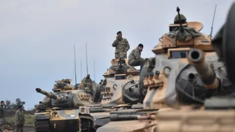 AFP Turkish troops at Syrian border, 21 Jan 18