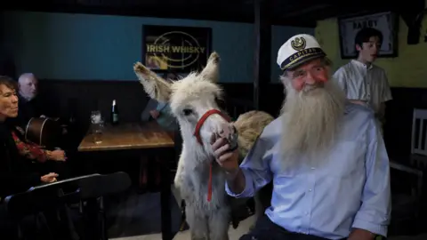 Reuters Pake Diskin with Holly the Donkey