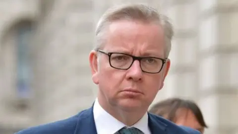 PA Michael Gove