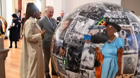 Getty Images King Charles is shown 'The World Reimagined Globes' at the Central Library and Art Gallery