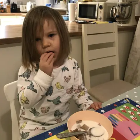 Helen Edwards Beth Edwards eating her breakfast.