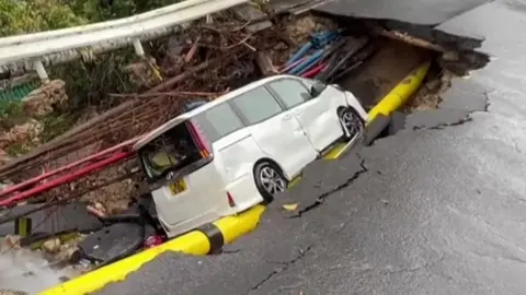 A car stuck in a crevice