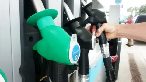 Getty Images Pumps at a petrol station