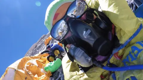 Di Gilbert Back at top camp after summit