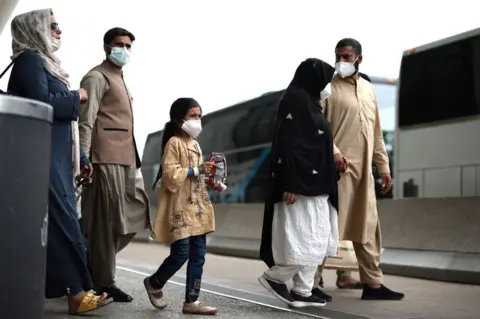 Getty Images Afghan refugees arriving in the US in August