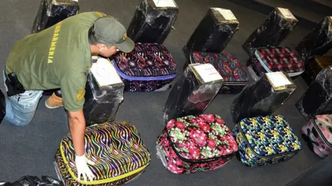AFP Seized cocaine and suitcases, 22 Feb 18