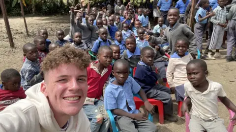 Jack Segelov Jack Segelov and school children in Zambia