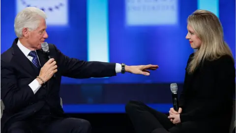 Getty Images On stage with former US President Bill Clinton in 2015