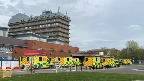 BBC Ambulances waiting outside Gloucestershire Royal Hospital