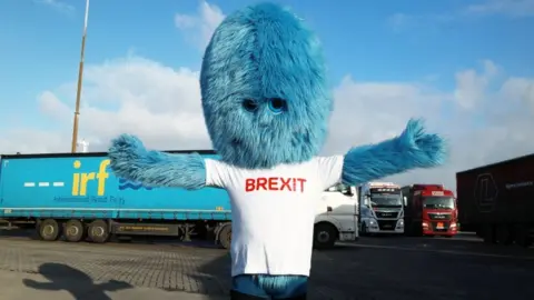 Reuters A blue furry monster known as the "Brexit Monster" makes an appearance in the port of Rotterdam, Netherlands December 1, 2020.