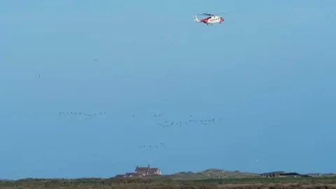 Gary Pearson Helicopter along the Norfolk coast