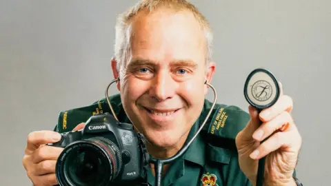 Thomas Byron Photography Paramedic Chris Porsz with camera in hand