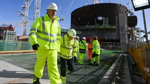 Getty Images Boris Johnson tours the Hinkley Point C site