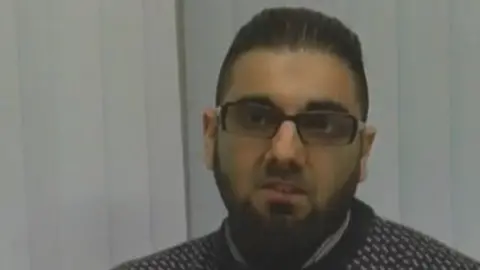 Met Police Still from a video clip showing Usman Khan praising Learning Together