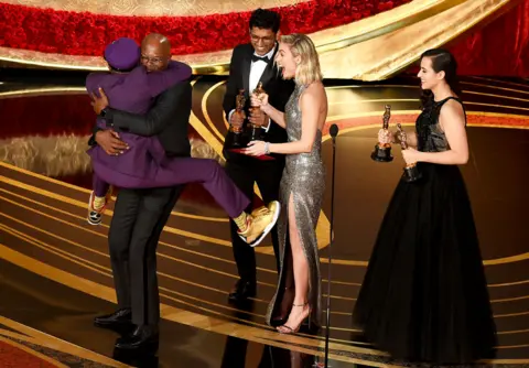 AFP Spike Lee jumps in the arms of Actor Samuel L. Jackson