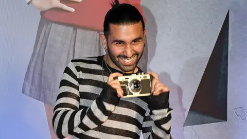 Getty Images Internet personality and social activist Orhan Awatramani poses for a photo at the red carpet premiere of the upcoming film 'Farrey' in Mumbai