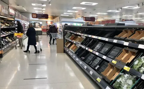 PA Media Empty shelves in a supermarket in Northern Ireland