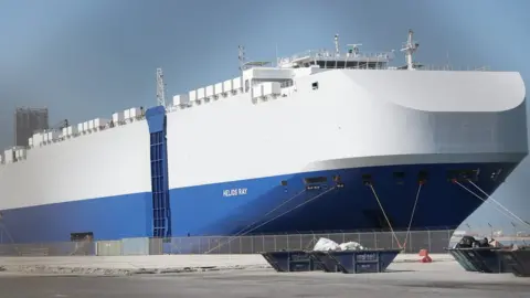 EPA MV Helios Ray, docked at Dubai following explosion that damaged its hull (28 February 2021)