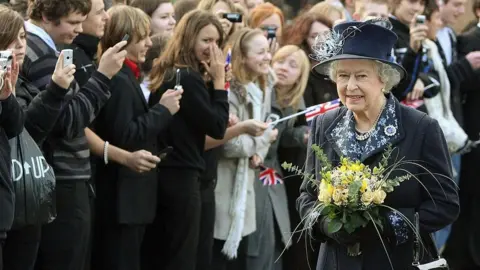 Getty Images Queen Elizabeth ll arrives at the Samuel Whitbread Community College