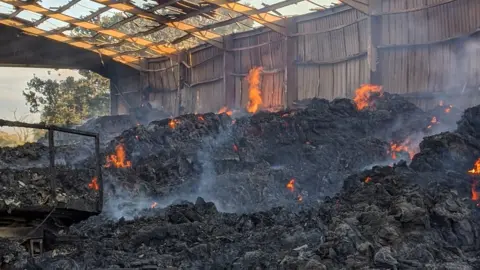 @BurtonFire Hay bales on fire