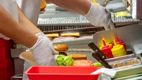 Getty Images workers-in-takeaway
